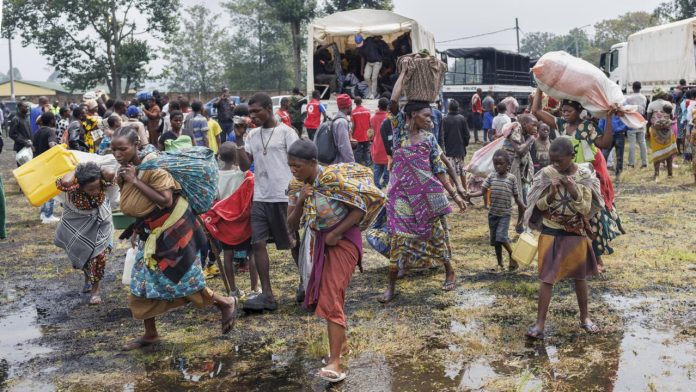 Des congolais fuyant les affrontements en cours dans l'est de la République démocratique du Congo arrivent au camp de transit de Rugerero à Gisenyi, au Rwanda, le 28 janvier 2025. © Tony Karumba, AFP